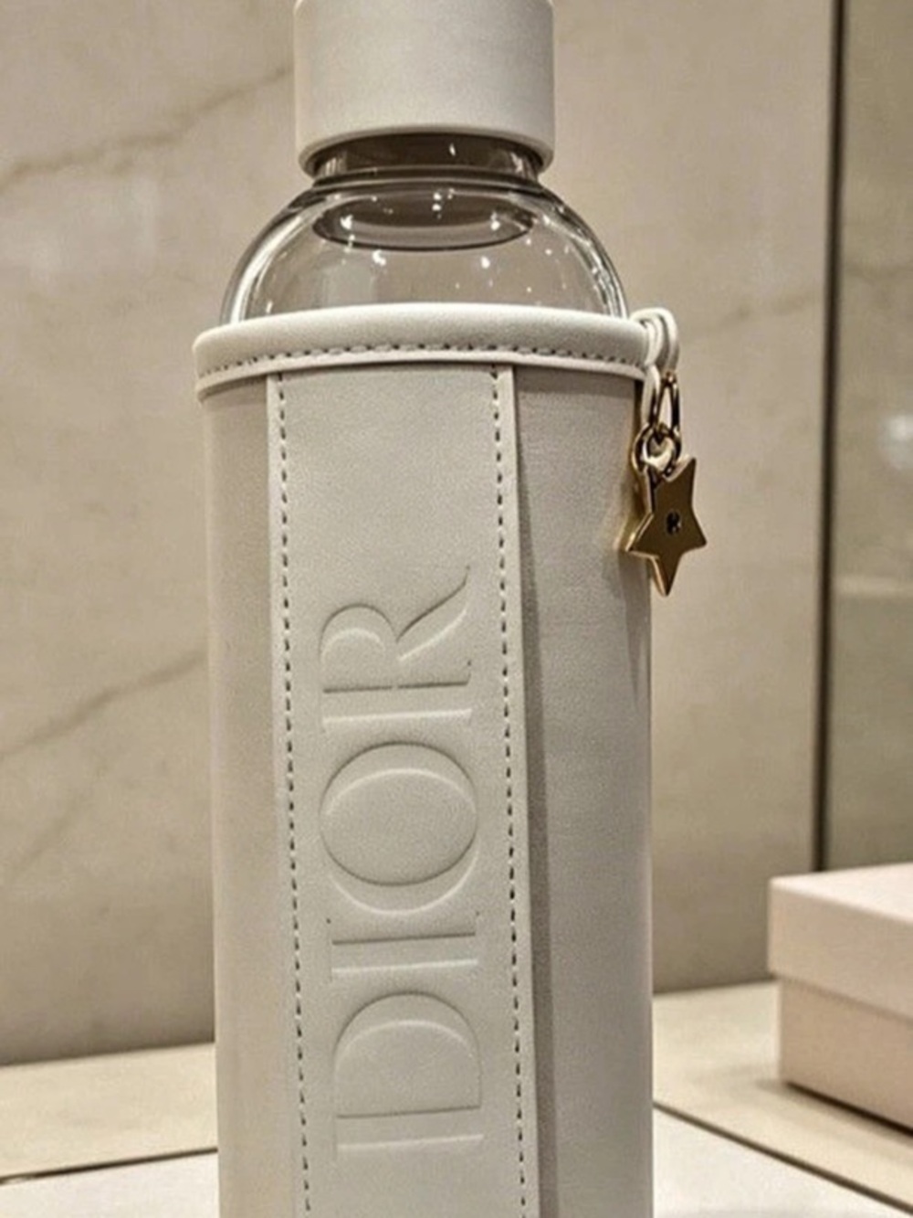 Dior Beauty Glass Water Bottle with White Sleeve and Star Charm White Sleeve